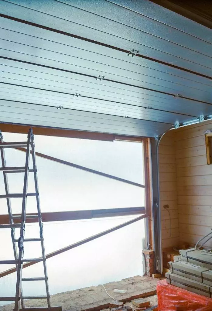 Construction of an Industrial Building with Steel Ceiling Installation in Progress at a Commercial Site