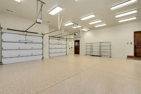 Garage interior with newly installed doors at a home in Edmonton available for same day repair services Garage interior with newly installed doors at a home in Edmonton available for same day repair services