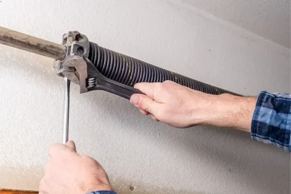 Expert torsion spring repair for garage doors in Edmonton by trained technicians Expert torsion spring repair for garage doors in Edmonton by trained technicians