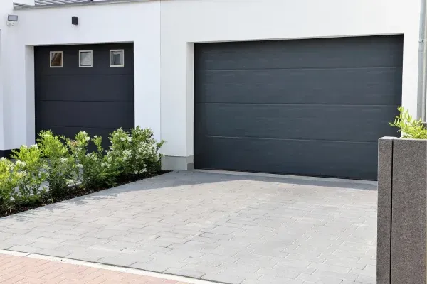 Expert garage door maintenance service enhancing homes with a fresh look near residential area Expert garage door maintenance service enhancing homes with a fresh look near residential area