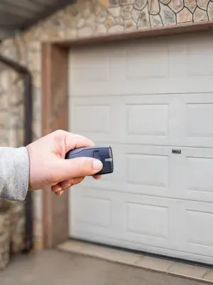 Remote control activation for a garage door in a residential setting during daylight hours Remote control activation for a garage door in a residential setting during daylight hours